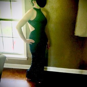 High neck sequined black on black long dress with cut outs and slit